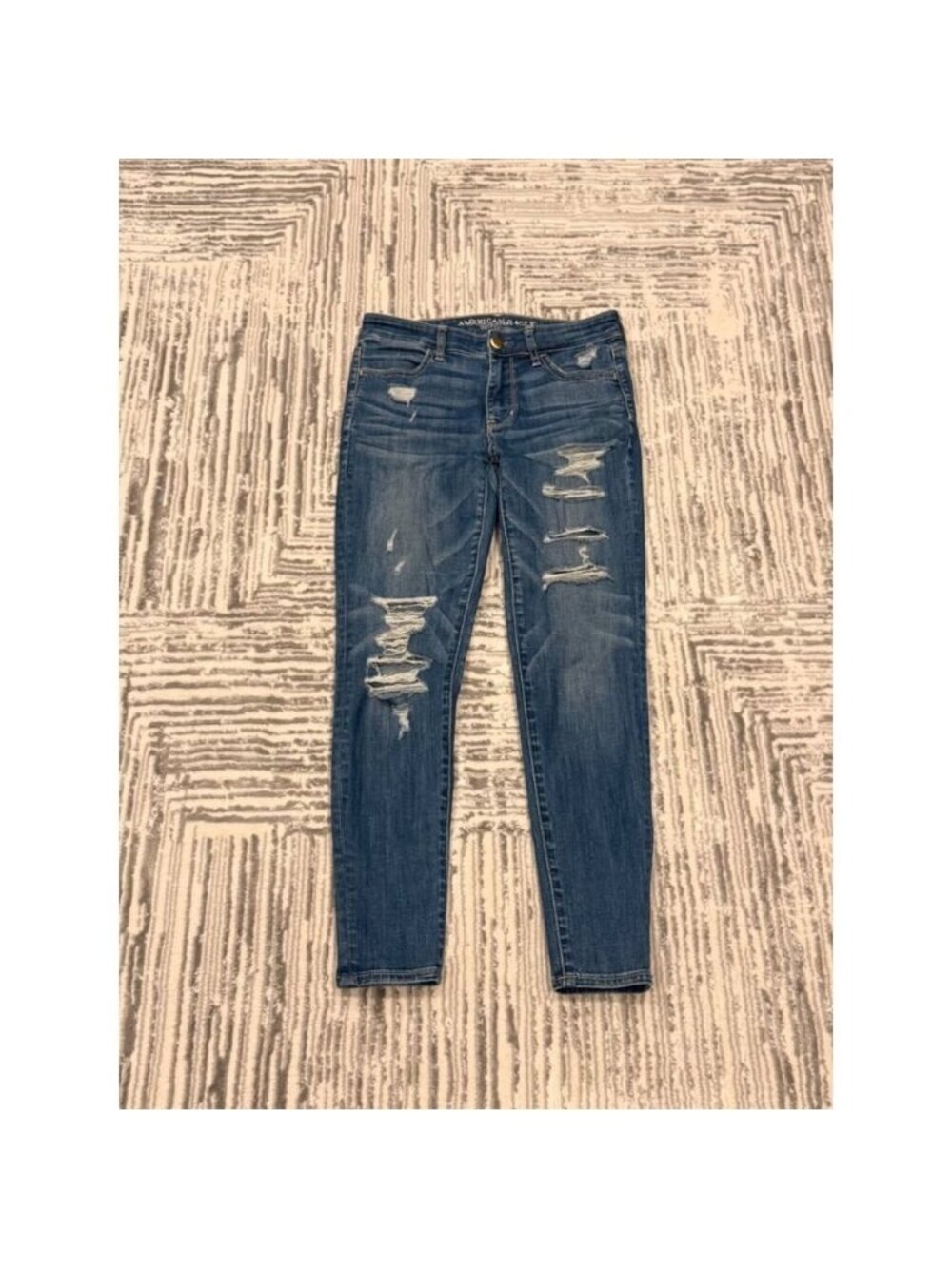 American Eagle Outfitters women's size 4 blue distressed Hi-Rise Jegging Jeans